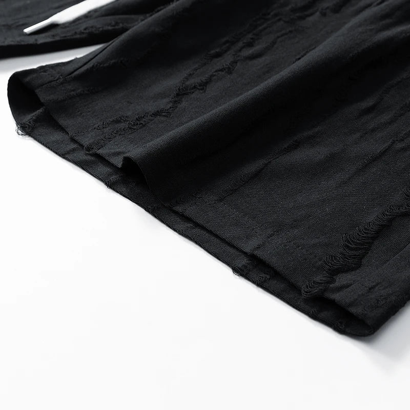 MAGLIETTA E PANTALONI CORTI