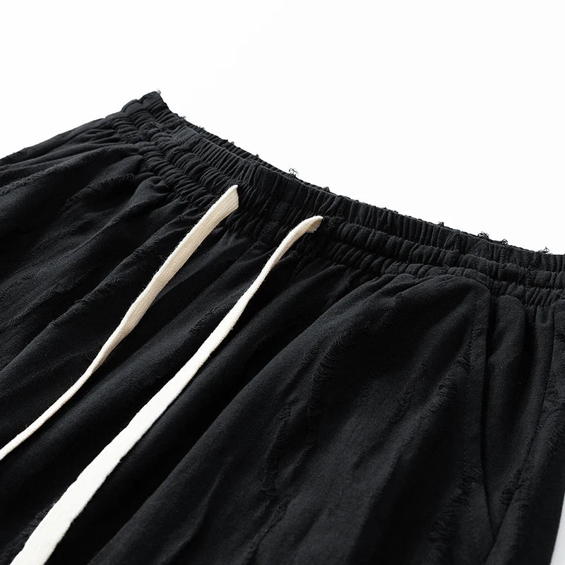 MAGLIETTA E PANTALONI CORTI